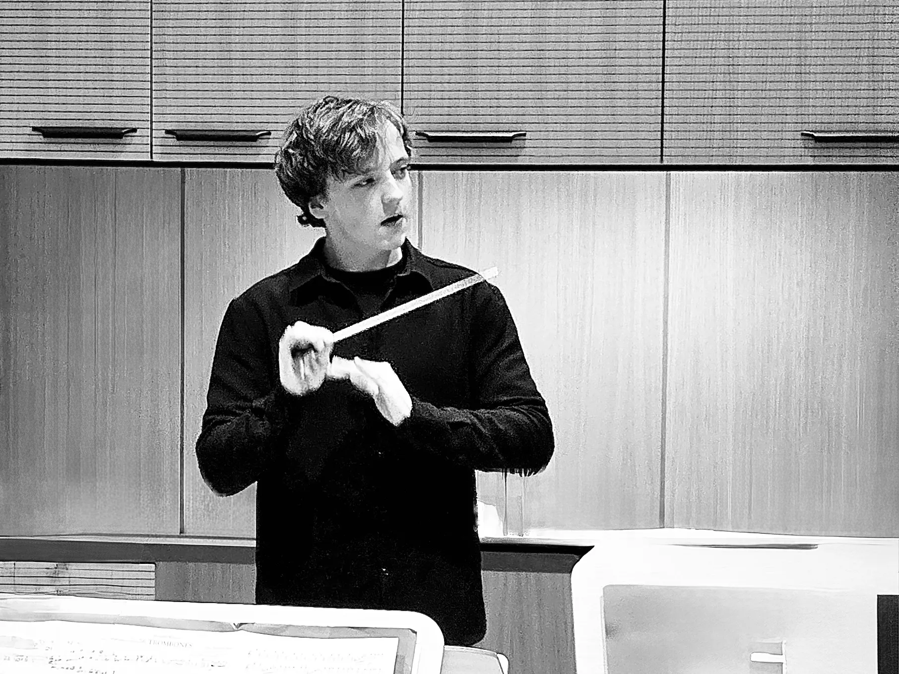Jan conducting in front of an orchestra